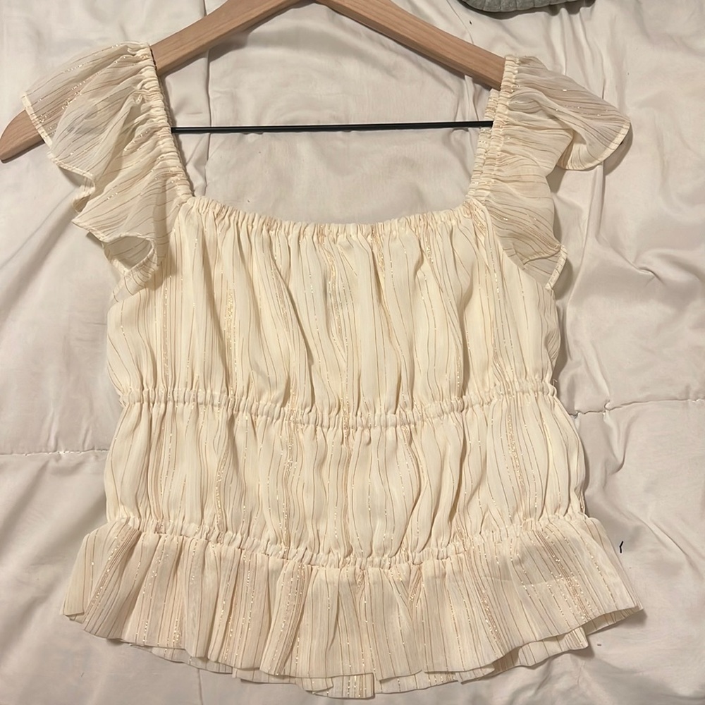 White express top with gold